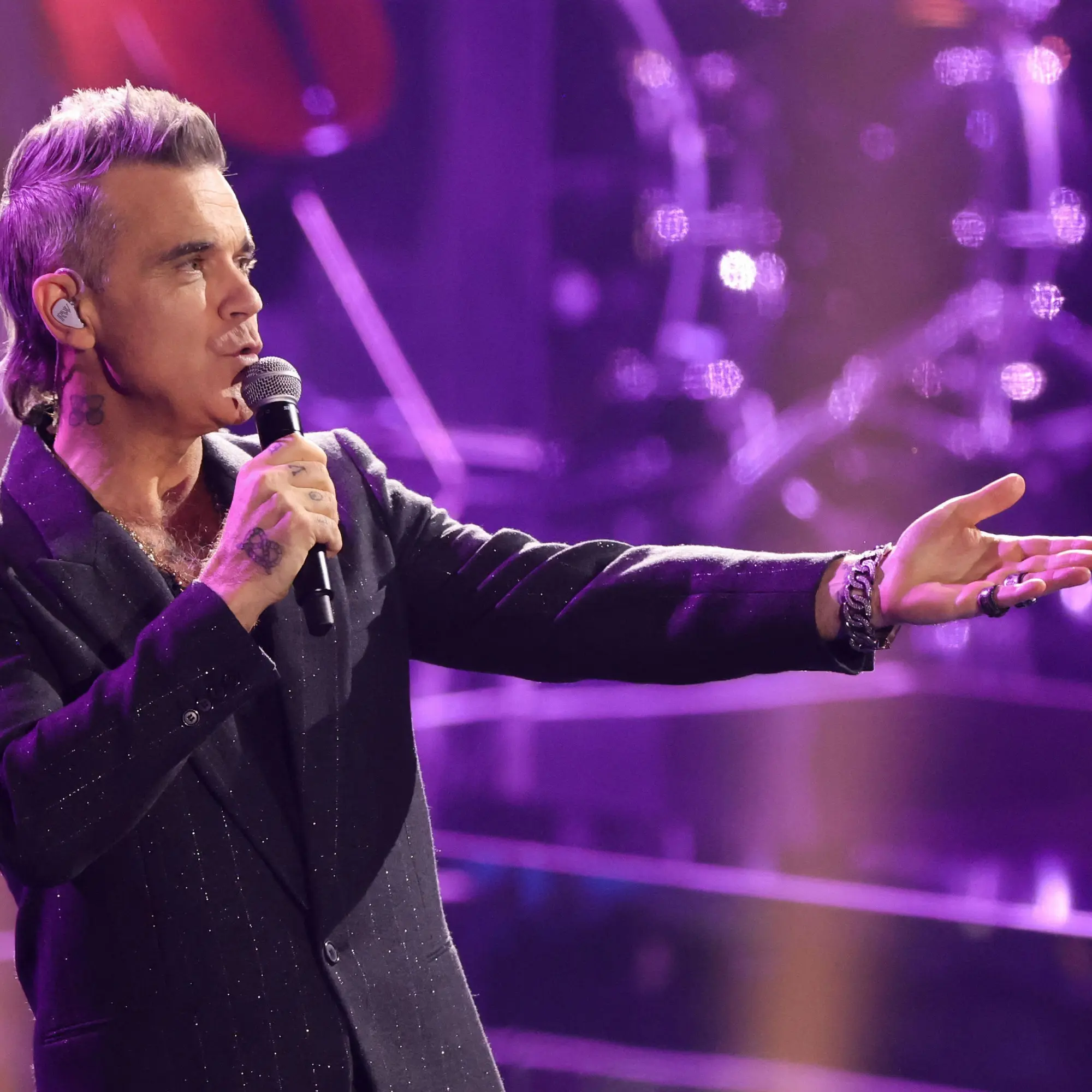 La carriera di Robbie Williams: un’icona della musica pop